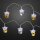 12-pcs. Lightchain with Acryl-Angel and Bells, warm-white, transparent cable, Indoor-Transformer